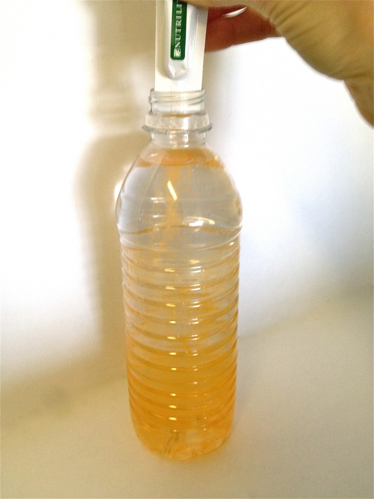 Add Nutrilite Twist Tube to water.