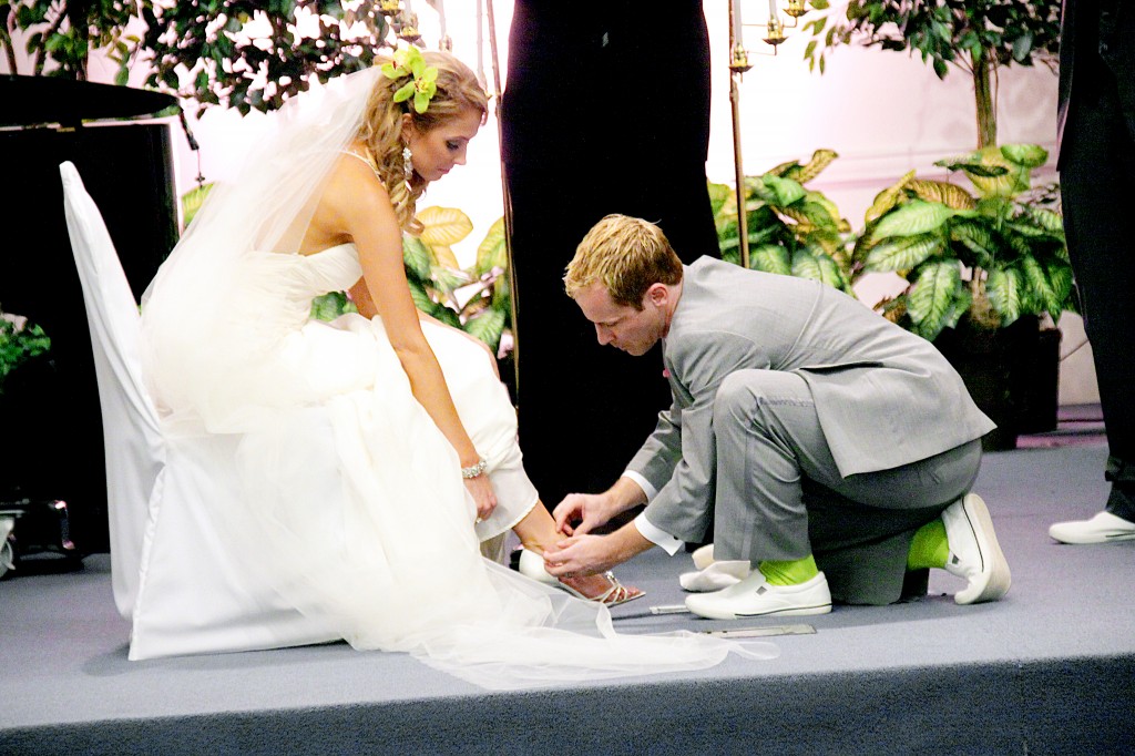 Footwashing Ceremony unhooking shoes