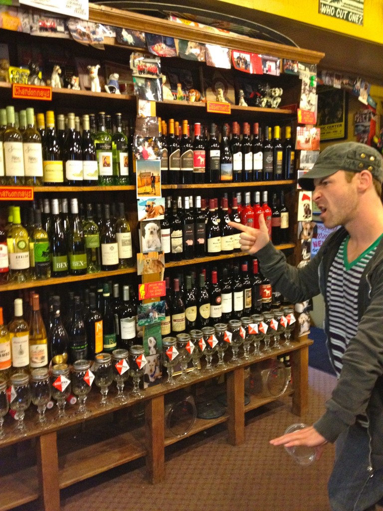 Scott looking at merchandise at Yellow Dog Eats