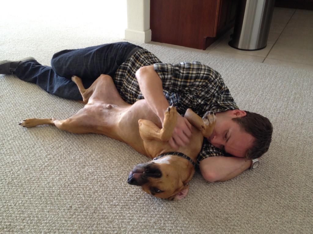 Scott and Roadie playing on floor